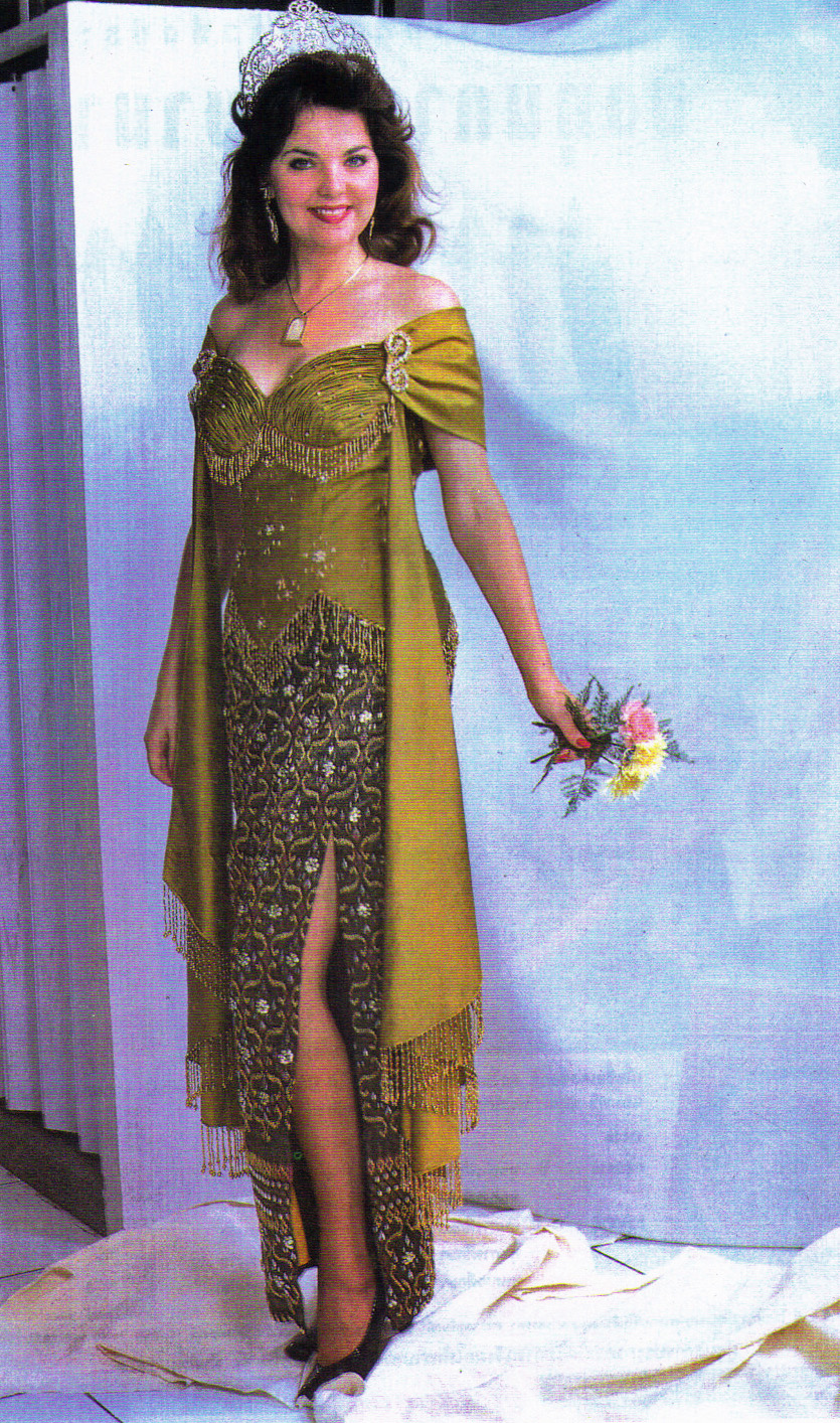 Susan wore this gown in the Charity Fashion Shows. It was presented to Susan as a gift from the Thai Arts and Cultural Committee. Hand made Thai Gown made out of Thai Silk and hand beaded. Value in 1993-$25,000