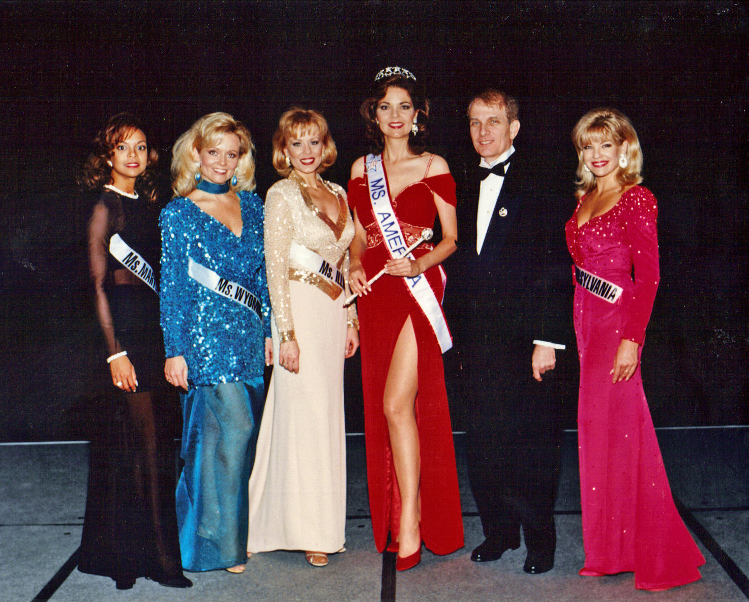 Ms. America & her court with the founder/owner of the pageant Richard Simon.